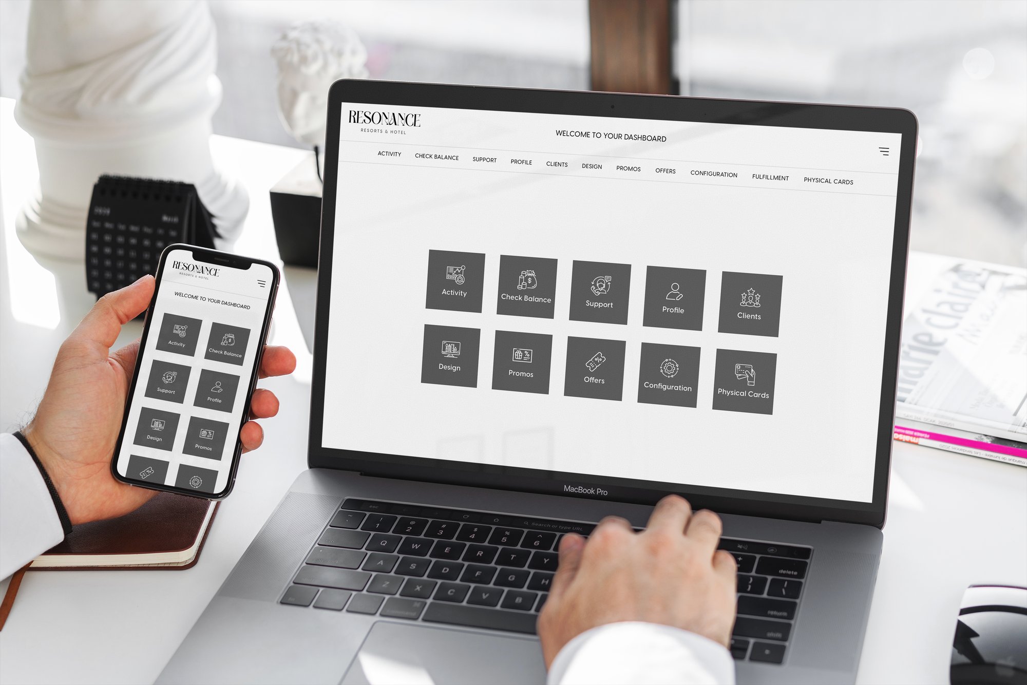 Hotel staff using unified management portal on laptop and smartphone for guest engagement and resort loyalty program integration Hotel staff using unified management portal on laptop and smartphone for guest engagement and resort loyalty program integration